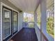 Charming balcony with white railings and wood deck, perfect for enjoying the outdoors at 3550 Beaver Cove Rd, Cumming, GA 30041
