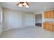 Dining room featuring tile floors, closet space, and views of the connecting living room at 3550 Beaver Cove Rd, Cumming, GA 30041