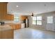Bright kitchen featuring stainless steel appliances, tile floors, and many windows at 3550 Beaver Cove Rd, Cumming, GA 30041