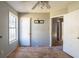 A room with an open doorway and window is ready to be renovated into a cozy living space at 6381 Phillips Creek Dr, Lithonia, GA 30058