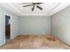Spacious bedroom featuring a ceiling fan, and ample natural light potential at 6381 Phillips Creek Dr, Lithonia, GA 30058