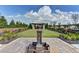 Beautiful community garden featuring a fountain and landscaped grounds, ideal for leisurely strolls at 951 Olmsted Ln, Johns Creek, GA 30097