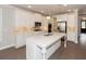Spacious kitchen featuring a large island, stainless appliances, and ample counter space at 951 Olmsted Ln, Johns Creek, GA 30097