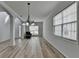 Bright living room features hardwood floors, natural light and an open floor plan at 1255 Leisure Lake Drive, Lawrenceville, GA 30044