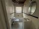 Bathroom needing repair, toilet, sink, shower at 939 Hope Sw Dr, Atlanta, GA 30310