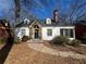 Charming one-story home with stone accents, dormers and a classic brick chimney at 939 Hope Sw Dr, Atlanta, GA 30310