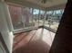 Bright sun room with brick floor and lots of windows at 939 Hope Sw Dr, Atlanta, GA 30310