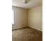 Bedroom featuring a neutral color palette, carpet flooring, and good natural light at 3636 Hopkins Ct, Powder Springs, GA 30127