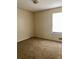 Cozy bedroom features carpeted floors, neutral walls, and a window for natural light at 3636 Hopkins Ct, Powder Springs, GA 30127