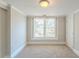 Sun-filled bedroom with a neutral carpet and a sun-filled window at 940 Blair Bridge Rd, Austell, GA 30168