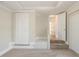 Neutral bedroom with carpet, closet, and an open doorway to hall at 940 Blair Bridge Rd, Austell, GA 30168