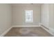 Bedroom featuring a window providing natural light and a double door closet at 940 Blair Bridge Rd, Austell, GA 30168