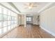 Inviting living room with large windows, hardwood floors, and open layout at 940 Blair Bridge Rd, Austell, GA 30168