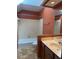 Bathroom features a shower/tub combination and a vanity with ample counter space at 1531 Glendale Dr, Lawrenceville, GA 30043