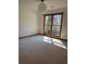 Bright bedroom with a large window and cozy carpet at 1531 Glendale Dr, Lawrenceville, GA 30043