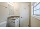 Well-lit bathroom with granite countertop vanity offers a convenient and stylish space at 2236 Chestnut Hill Cir, Decatur, GA 30032