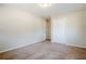 Bedroom featuring neutral carpet, closet, and ample natural light at 2236 Chestnut Hill Cir, Decatur, GA 30032