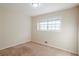 Cozy bedroom with neutral carpet, a window providing natural light at 2236 Chestnut Hill Cir, Decatur, GA 30032