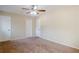 This bedroom features a ceiling fan and has ample closet space for storage at 2236 Chestnut Hill Cir, Decatur, GA 30032