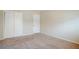 Bedroom featuring neutral carpet, a window and a large closet at 2236 Chestnut Hill Cir, Decatur, GA 30032