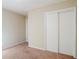 Bedroom featuring neutral carpet and closet with sliding doors at 2236 Chestnut Hill Cir, Decatur, GA 30032