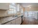 Bright kitchen with stainless steel dishwasher and double sink with natural light at 2236 Chestnut Hill Cir, Decatur, GA 30032