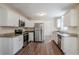 Bright kitchen with white cabinets, granite countertops, and stainless steel appliances at 2236 Chestnut Hill Cir, Decatur, GA 30032