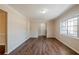 Spacious living room with wood floors, large window, and ample natural light at 2236 Chestnut Hill Cir, Decatur, GA 30032