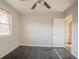 Bedroom featuring a ceiling fan, a window, and hardwood floors at 473 Oakside Sw Dr, Atlanta, GA 30331