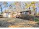 Charming brick home with a well-maintained front yard and attached garage at 473 Oakside Sw Dr, Atlanta, GA 30331