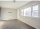 Bright living room featuring natural light, modern floors, and neutral walls at 473 Oakside Sw Dr, Atlanta, GA 30331