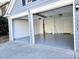 Spacious two-car garage with clean, epoxy-coated floor at 1064 Wenham Ln, Lawrenceville, GA 30044