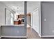 Cozy kitchen features stainless steel appliances, wooden cabinetry, and a window over the sink at 1064 Wenham Ln, Lawrenceville, GA 30044