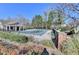 Community pool with an attractive fence and landscaping at 1064 Wenham Ln, Lawrenceville, GA 30044