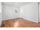 Bright bedroom featuring hardwood floors, natural light, and a spacious closet at 4326 Newton Cir, Douglasville, GA 30134
