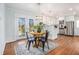 Dining room featuring access to the exterior deck and an open-concept kitchen at 4326 Newton Cir, Douglasville, GA 30134