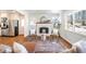 Bright living room featuring a brick fireplace at 4326 Newton Cir, Douglasville, GA 30134