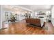 Open concept living room, dining and kitchen featuring hardwood floors and lots of natural light at 4326 Newton Cir, Douglasville, GA 30134