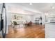 Open concept living room with hardwood floors, lots of natural light, and neutral finishes at 4326 Newton Cir, Douglasville, GA 30134
