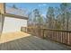 Spacious deck that is perfect for enjoying the wooded and private backyard at 9089 Hanover St, Lithia Springs, GA 30122