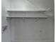 An empty closet with shelving at 933 Carla Pl, Norcross, GA 30093