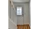 Bright entryway with a decorative glass front door and staircase leading to the upper level at 933 Carla Pl, Norcross, GA 30093