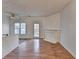 Open-concept living space with fireplace and light-filled patio access, blending indoor and outdoor living at 933 Carla Pl, Norcross, GA 30093