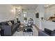 Cozy living room with stylish furniture, a sleek entertainment center, and a welcoming atmosphere at 933 Carla Pl, Norcross, GA 30093