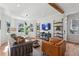 Sun-filled living room featuring hardwood floors and stylish shelving at 1898 Woodland Hills Nw Ave, Atlanta, GA 30318