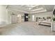 Expansive main bedroom boasting tray ceilings, chandelier, fireplace, and neutral carpet at 2634 Greenes Ln, Powder Springs, GA 30127