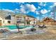 View of in-ground pool featuring waterfall, stone surround, modern lounge chairs and cabana at 2634 Greenes Ln, Powder Springs, GA 30127