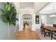 Elegant foyer with hardwood floors, chandelier, and staircase leading to upper level at 913 Thornington Pl, Roswell, GA 30075