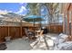 Patio featuring outdoor furniture, an umbrella, a grill, and a privacy fence at 913 Thornington Pl, Roswell, GA 30075