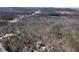Aerial view of a home nestled among trees, offering privacy and natural beauty at 15 York Trce, Cartersville, GA 30121